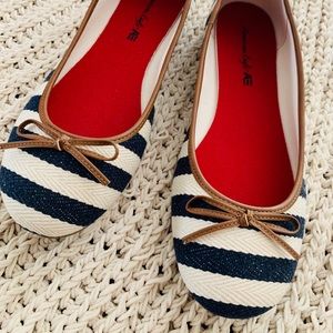 Navy and cream ballet flats.